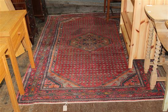 Red ground close pattern Persian rug